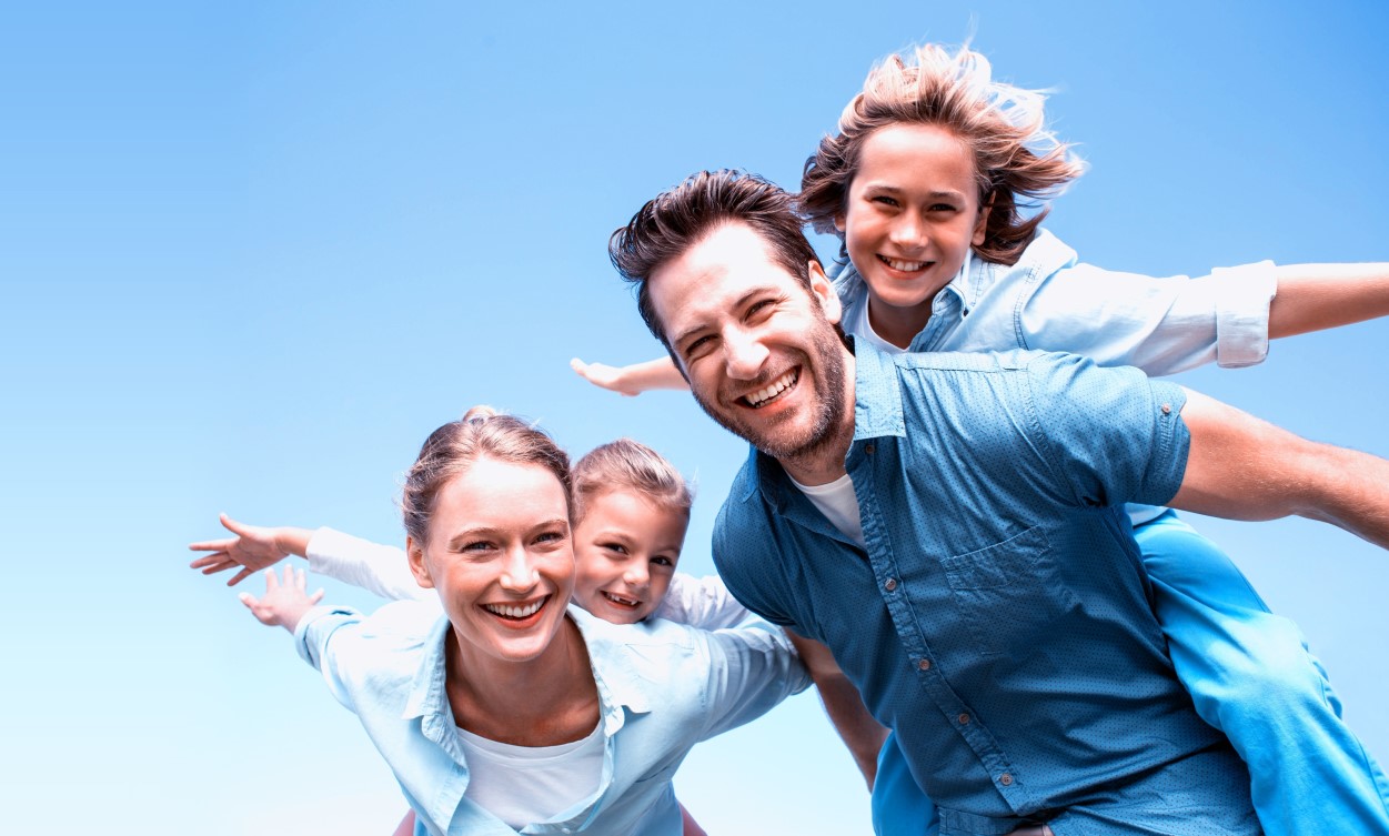 Happy parents with their children